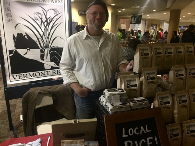 Erik Andrus sells his rice and duck eggs at the Burlington Farmers Market - SUZANNE PODHAIZER
