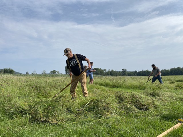 Competitors hand mowing - RACHEL HELLMAN ©️ SEVEN DAYS