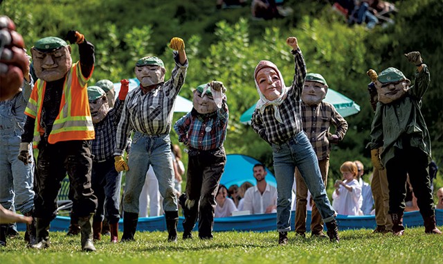 Chelsea Edgar (center back) performing as a garbageman at Bread and Puppet Theater - JOSH KUCKENS