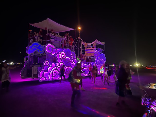 Because Fluffy had to remain parked until the playa dried out, at night Burning Man attendees gathered there for late-night dance parties. - COURTESY OF DUANE PETERSON