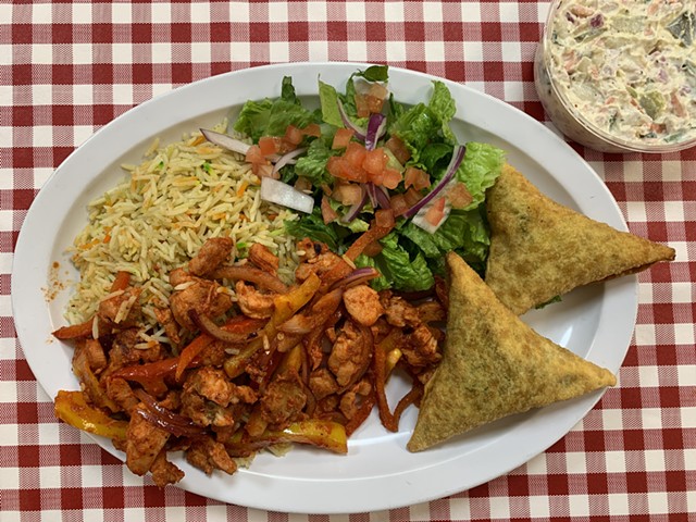 Somali rice and chicken, samosas and potato salad - MELISSA PASANEN ©️ SEVEN DAYS