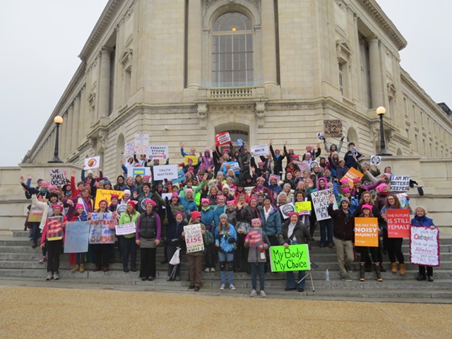 Vermonters gathered on the steps of the Cannon House Office Building on Capitol Hill prior to the rally and march. - COURTESY OF BOB PIERNO