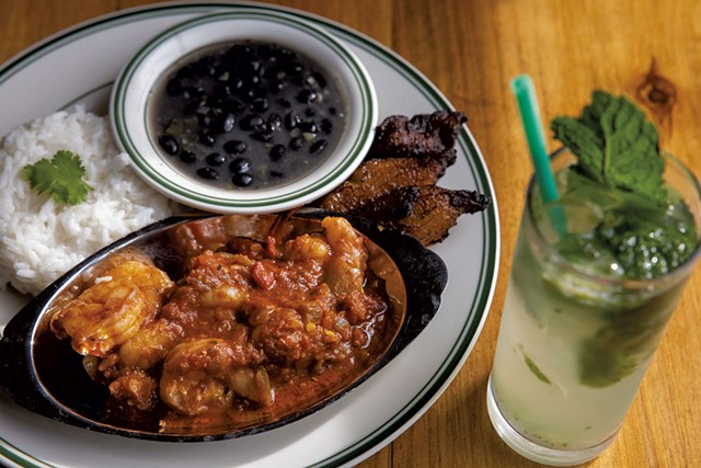Creole shrimp with black beans, maduros and a mojito at Santiago's Cuban Cuisine - FILE: JAMES BUCK