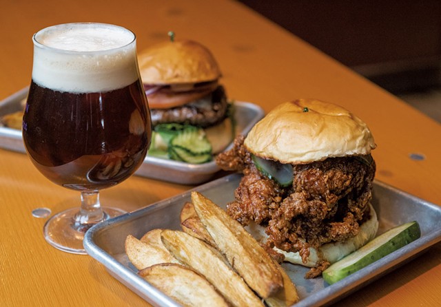 Burger and Morrisville hot chicken sandwich at Lost Nation Brewing - JEB WALLACE-BRODEUR