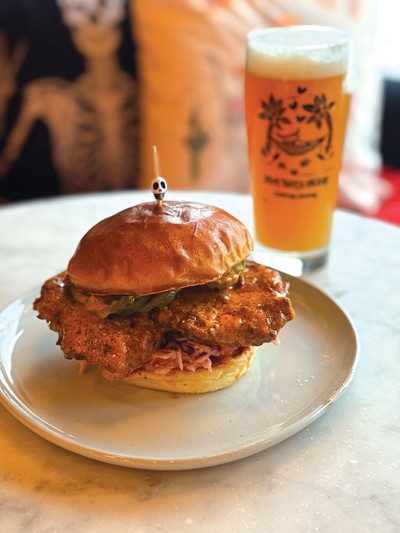 Devil Takes a Holiday Ninth - Circle fried chicken sandwich - COURTESY
