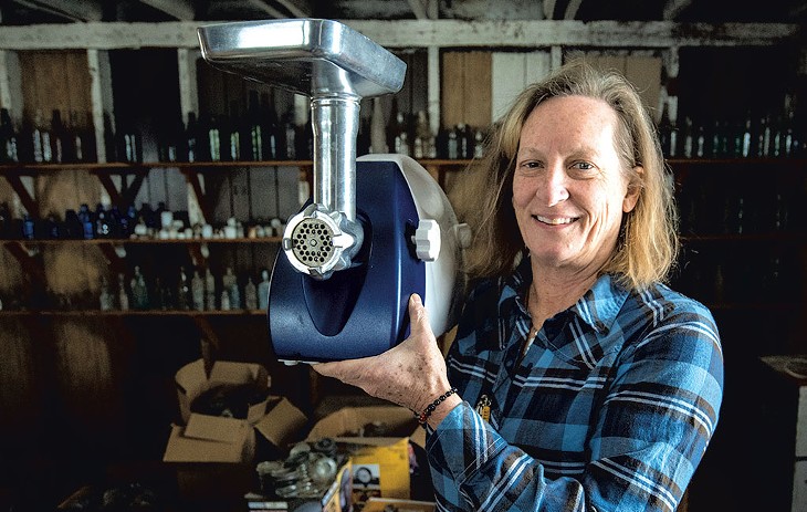 Laura Smith-Riva of Montpelier with an electric meat grinder she offered for sale on Front Porch Forum - JEB WALLACE-BRODEUR