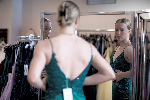 Cora Thomas trying on a prom dress - LUKE AWTRY