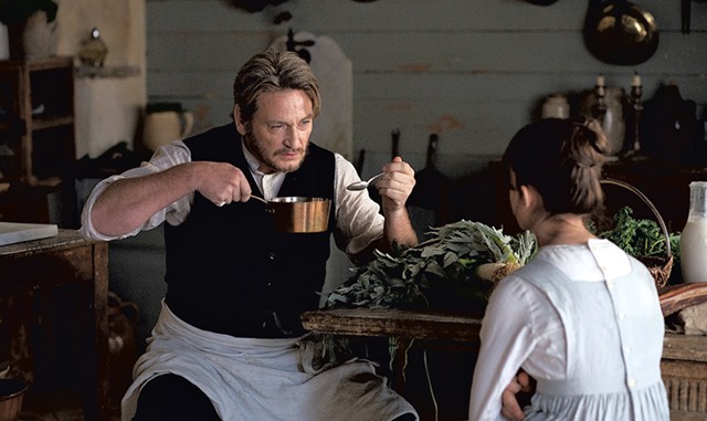 Beno&icirc;t Magimel and Bonnie Chagneau-Ravoire in The Taste of Things - COURTESY OF CAROLE BETHUEL/IFC FILMS