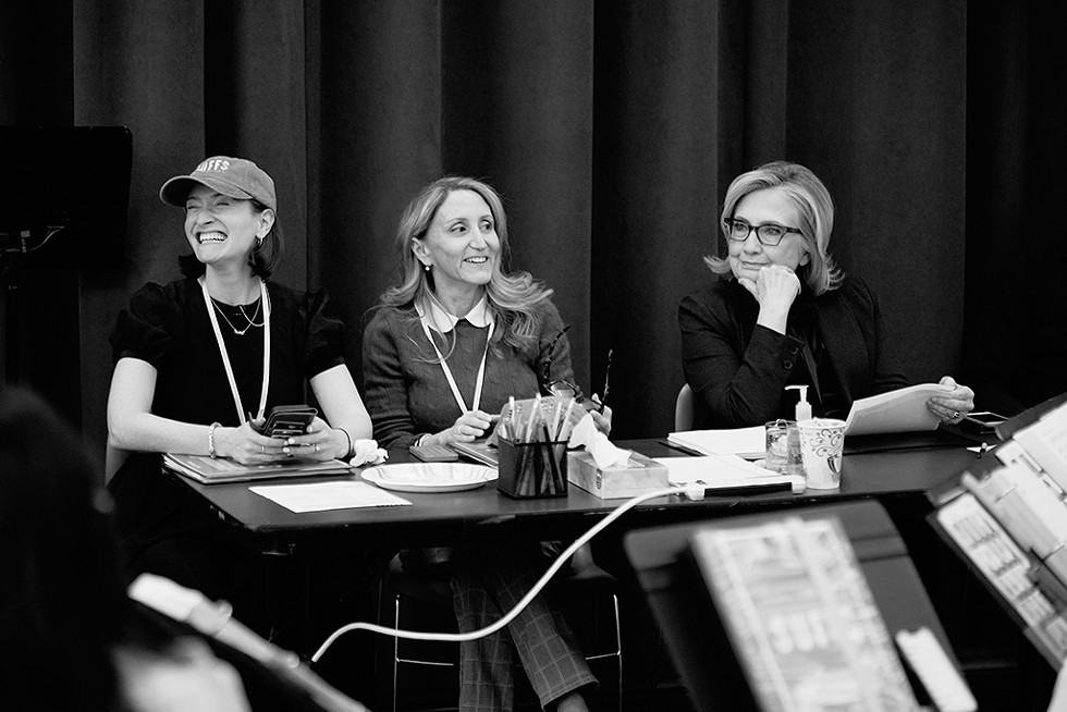From left: Lead producers Rachel Sussman and Jill Furman with coproducer Hillary Clinton at the first rehearsal of Suffs - COURTESY OF JENNY ANDERSON