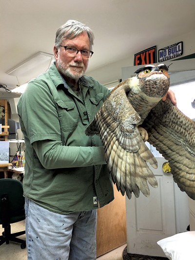 Floyd Scholz with a great horned owl - PAMELA POLSTON ©️ SEVEN DAYS