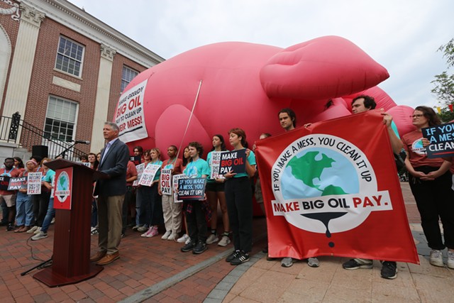 Activists discussing the bill last summer in Burlington - FILE: KEVIN MCCALLUM ©️ SEVEN DAYS