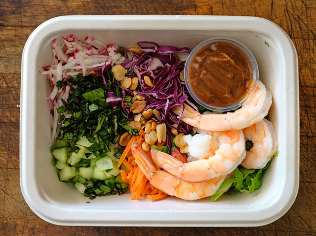 A prepared meal of a Spring Roll in a Bowl with poached shrimp - BEAR CIERI