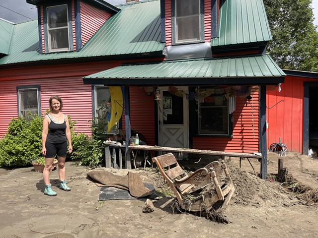 Jenni Belotserkovsky at her flood-damaged home in Plainfield. - ANNE WALLACE ALLEN ©️ SEVEN DAYS