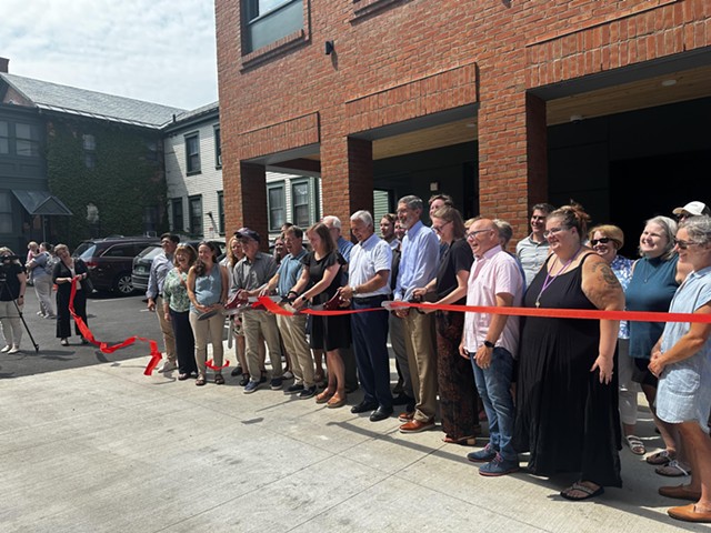 A ribbon cutting at Main Street Family Housing, a new affordable housing option in Burlington