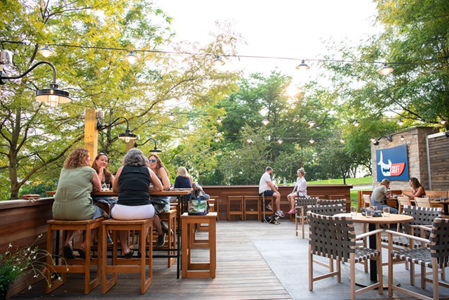 The outdoor dining area at Original Skiff - DARIA BISHOP