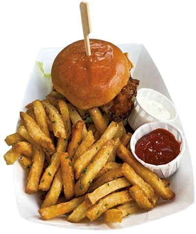 Fried chicken sandwich with fries at Mule Bar in Winooski