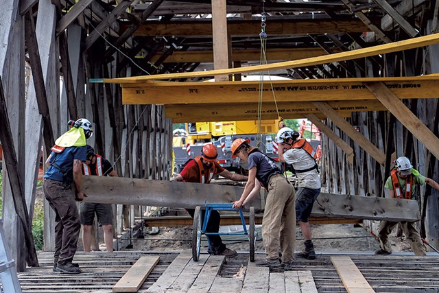 Workers removing the Sanborn Covered Bridge pieces - STEVE LEGGE