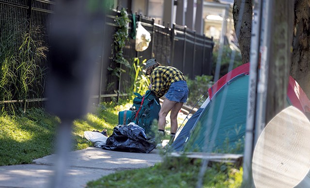 A person encamped on Buell Street outside the First Congregational Church of Burlington - JAMES BUCK