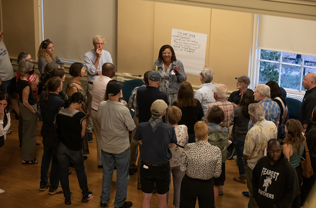 City attorney Jessica Brown (center) discusses the court system - LUKE AWTRY ©️ SEVEN DAYS