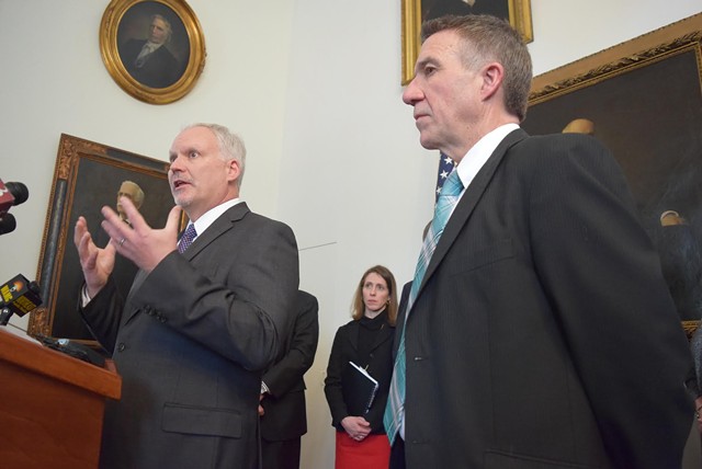 OneCare CEO Todd Moore addresses reporters with Gov. Phil Scott to his right. - FILE: TERRI HALLENBECK