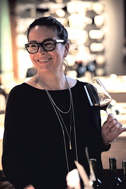 Lisa Strausser at Dedalus Wine Shop in Burlington - MATTHEW THORSEN