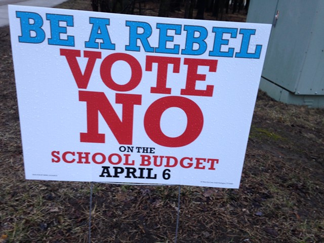 Sign encouraging voters to defeat budget - MOLLY WALSH
