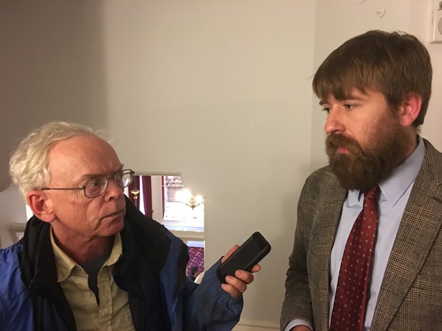 VTDigger's Mark Johnson interviews Paul Heintz of Seven Days and the Vermont Press Association after Wednesday's House vote on S.96. - JOHN WALTERS