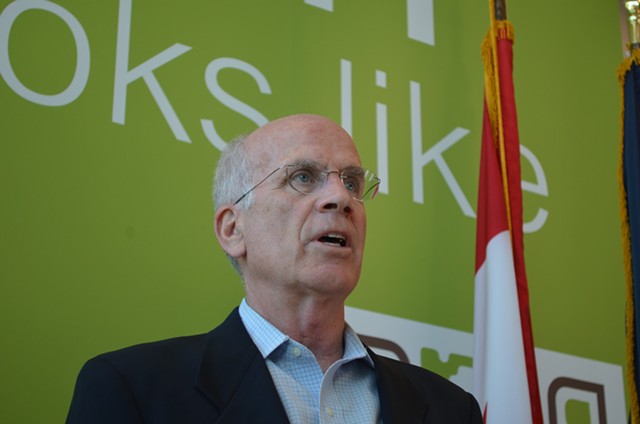 Rep. Peter Welch (D-Vt.) speaks at a press conference at the Burlington International Airport Tuesday. - ALICIA FREESE