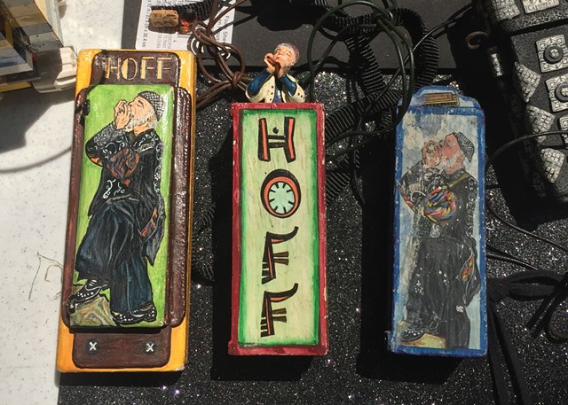 Three Hoffman-themed harmonica cases - RACHEL JONES