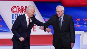 A Virus Takes Center Stage as Biden and Sanders Debate