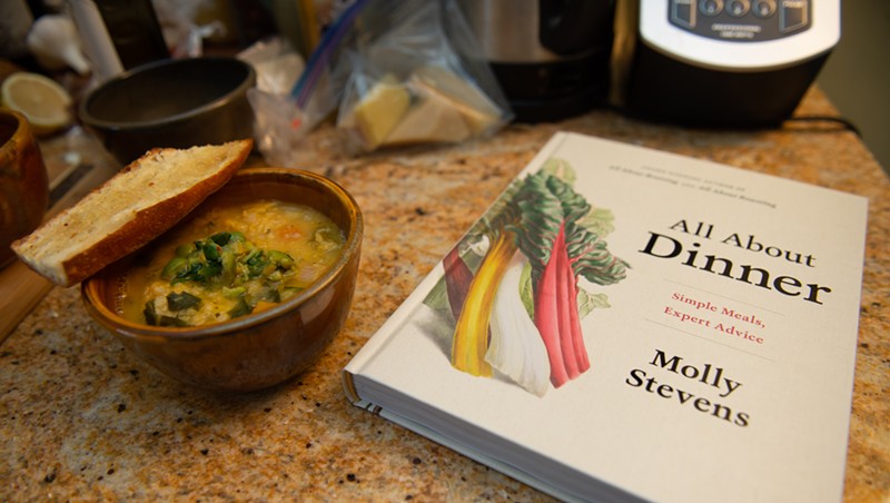 Bowl of soup and James Beard finalist cookbook by Molly Stevens