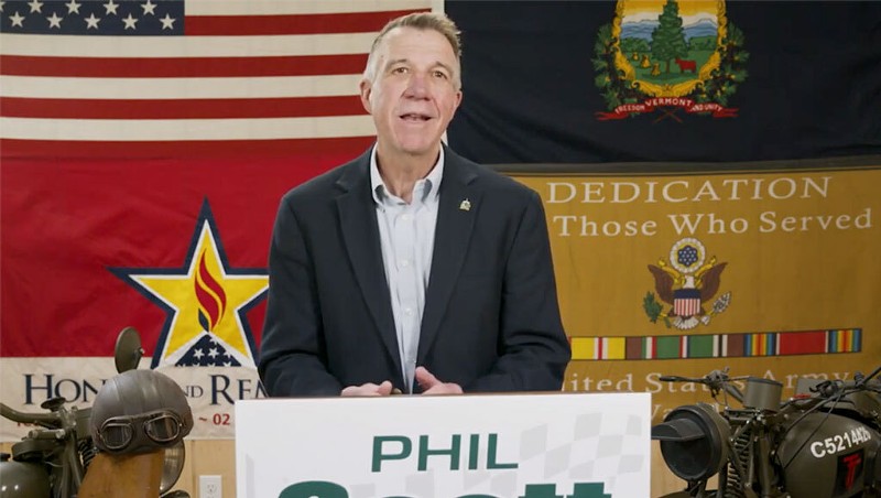 Gov. Phil Scott declares victory Tuesday in a video shot in his motorcycle garage.