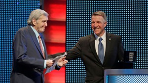 Gov. Phil Scott (right) inducts Ken Squier into NASCAR's Hall of Fame in Charlotte, N.C.
