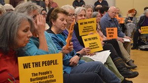 Opponents of the F-35s at the City Council meeting