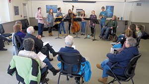 The University of Vermont Folk Music Club performing at Queen City Memory Caf&eacute;