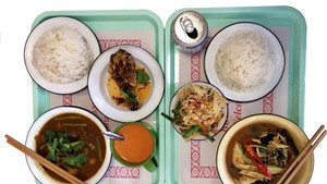 Fried chicken, papaya salad, jungle curry, cha Thai, and hunglay curry at Pumpui Grocer and Curry Shop