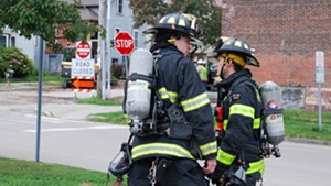Firefighters on scene ushered residents across the street.