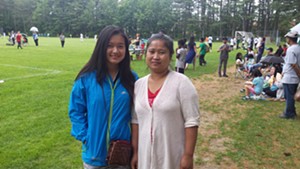 Interpreter Poe Poh (left) and Thaw Theet at Leddy Park in Burlington