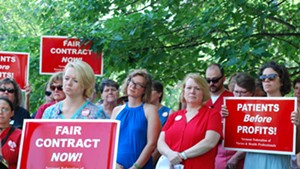 Union members and supporters at a press conference Monday morning announcing the strike notice