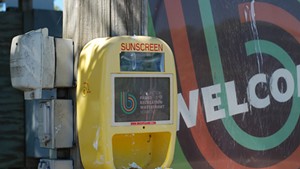 A sunscreen dispenser