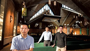 From left: Giang Vu, Thang Nguyen and Luan Tran at the Chapel of St. Michael the Archangel on the campus of Saint Michael's College