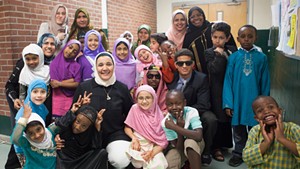 Students and teachers backstage at the Weekend Islamic School's annual show