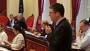 Rep. Matthew Trieber (D-Bellows Falls) presents the amended version of the minimum wage bill.