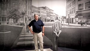 Mark Foley Jr. standing in "The Rutland Drawing" installation, by William Ramage