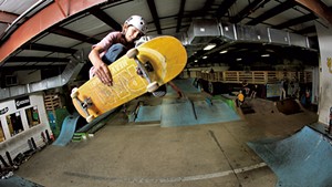 Cooper Qua doing a frontside Indy at Talent's former location