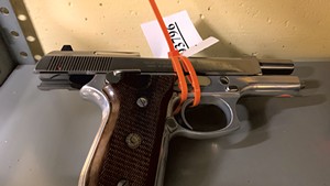 A handgun in state storage