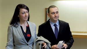 Jason Lawton, right, with his attorney, Rebecca Otey