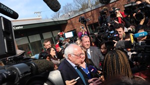Bernie Sanders speaking to reporters outside the polls in Burlington on Tuesday