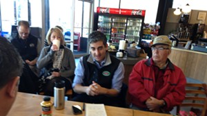 The mayor enjoys coffee and bagels with residents  in the South End