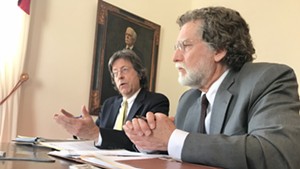 Administration economist Jeff Carr, left, and legislative economist Tom Kavet